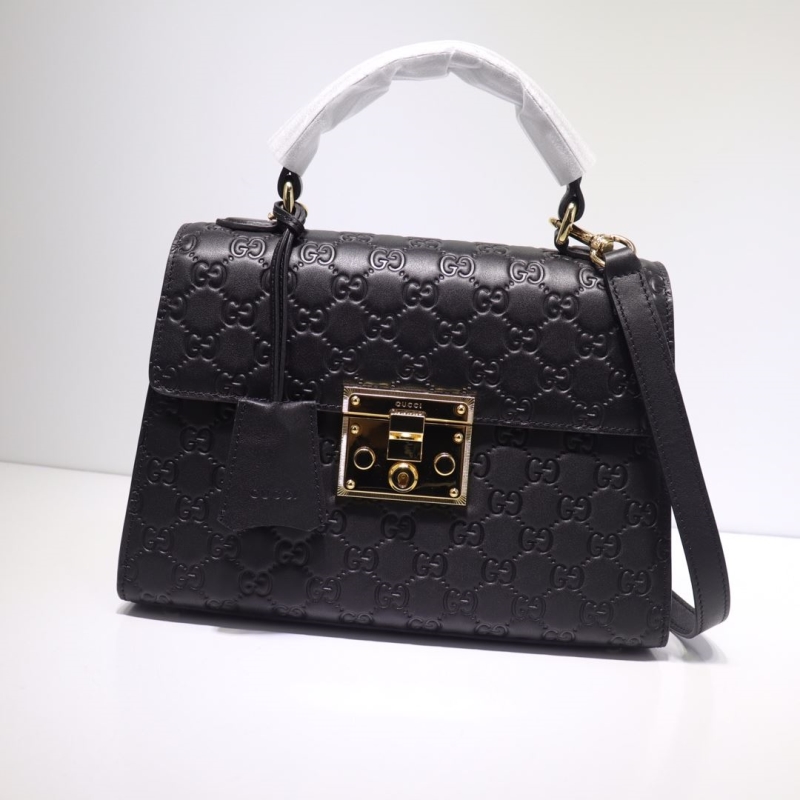 G*u*i top handle bags